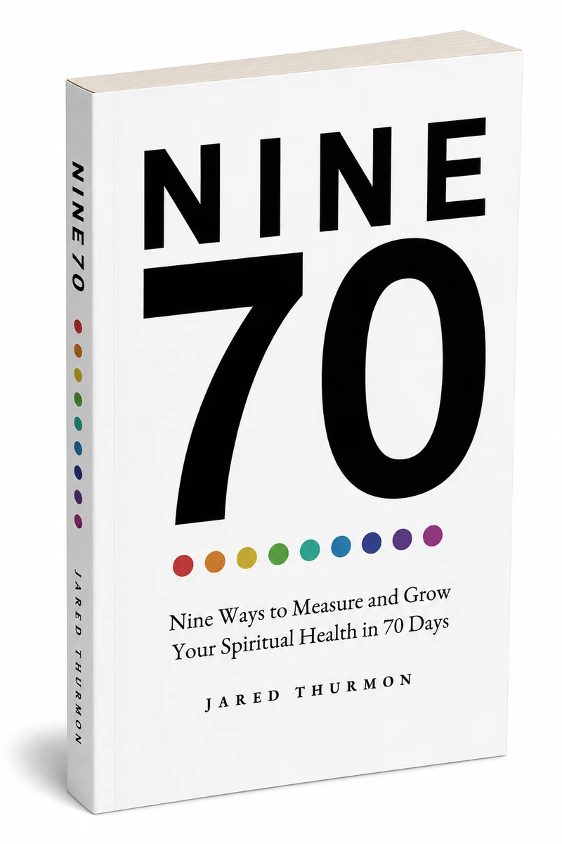 The NINE70 paperback: a white cover with NINE70 in large black type and nine colored dots